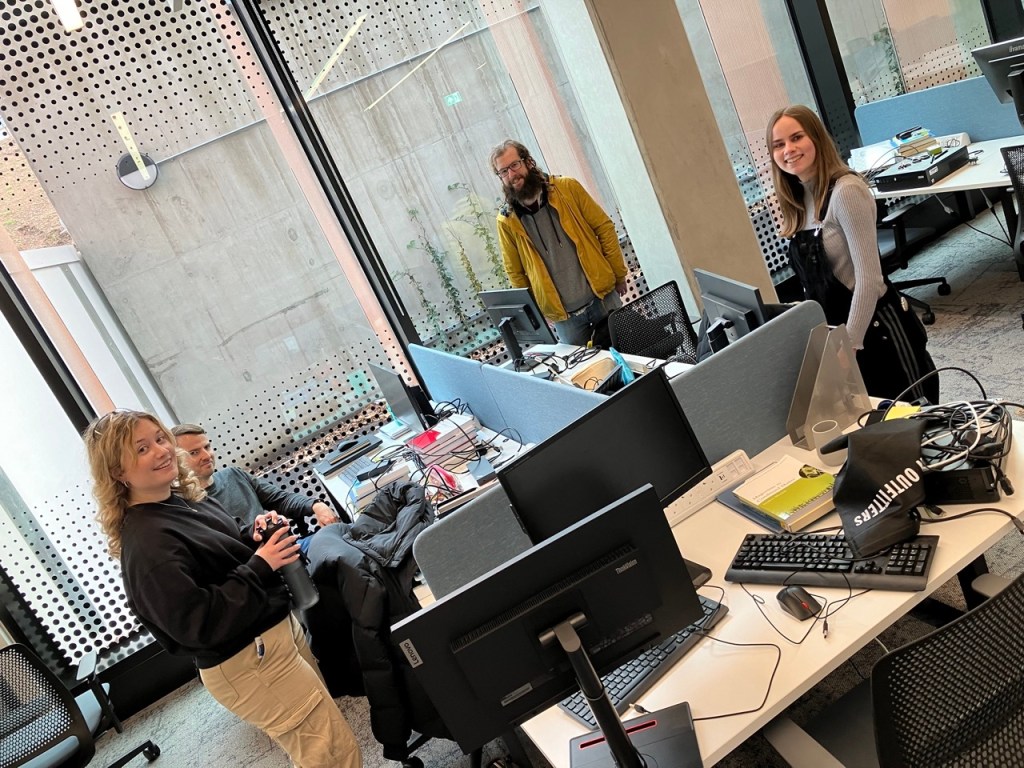 Sophie, Pat, Joe and Suzie settling in to the new group office